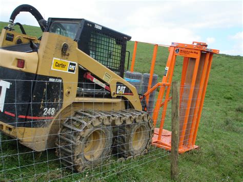 barbed wire fence attachment for skid steer|barbwire hog attachment.